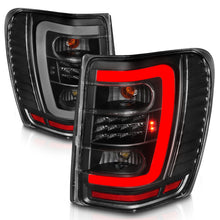 Load image into Gallery viewer, ANZO 1999-2004 Jeep Grand Cherokee LED Tail Lights w/ Light Bar Black Housing Clear Lens