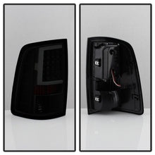 Load image into Gallery viewer, xTune 09-18 Dodge Ram 1500 LED Tail Lights - Black Smoke (ALT-ON-DR09-LBLED-BSM)