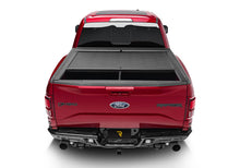 Load image into Gallery viewer, Roll-N-Lock 15-18 Ford F-150 XSB 65-5/8in M-Series Retractable Tonneau Cover