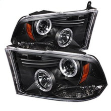 Load image into Gallery viewer, Spyder projector headlights for Dodge Ram 1500, 2009-2014, with halogen and LED halo, black design.