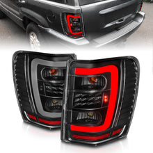 Load image into Gallery viewer, ANZO 1999-2004 Jeep Grand Cherokee LED Tail Lights w/ Light Bar Black Housing Clear Lens